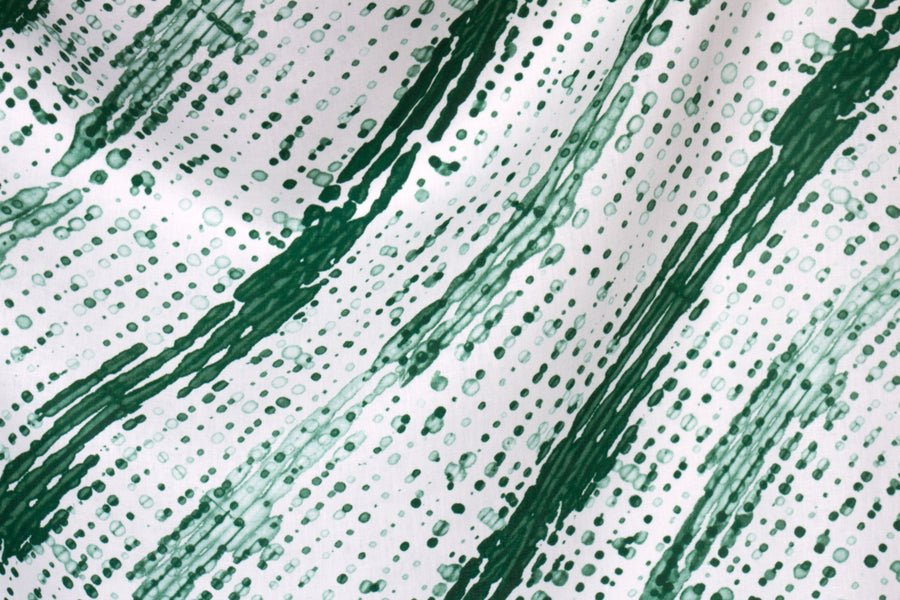 flowing 100% linen glissando shibori fabric in emerald green