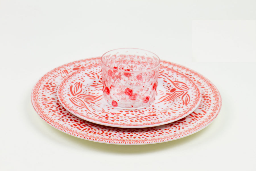Our porcelain plates come in a fresh bouquet of hues and  are effortless enough for everyday, and elegant enough for formal events. Combine with our hand-painted glasses, tablecloths, and placemats for knockout place settings. Dishwasher and microwave safe. Designed in Los Angeles and decorated by hand in the U.S.A. 
