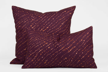 Two 100% linen staccato decolorato shibori pillows in plum purple, 20” x 20” and 12” x 20”