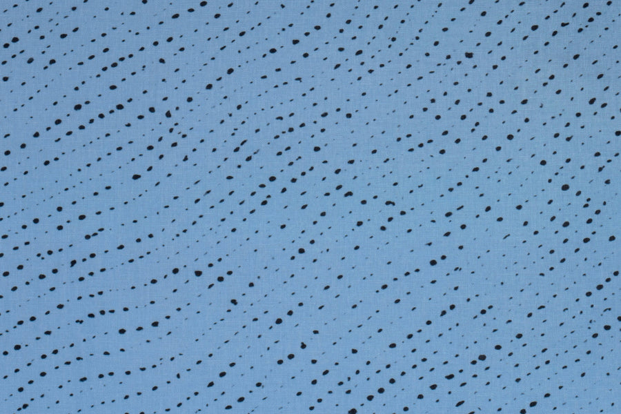 100% linen staccato nero shibori fabric by the yard up close in sky blue