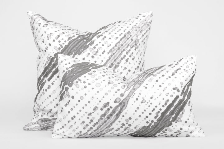 Two 100% linen glissando shibori pillows in storm grey, 20” x 20” and 12” x 20”