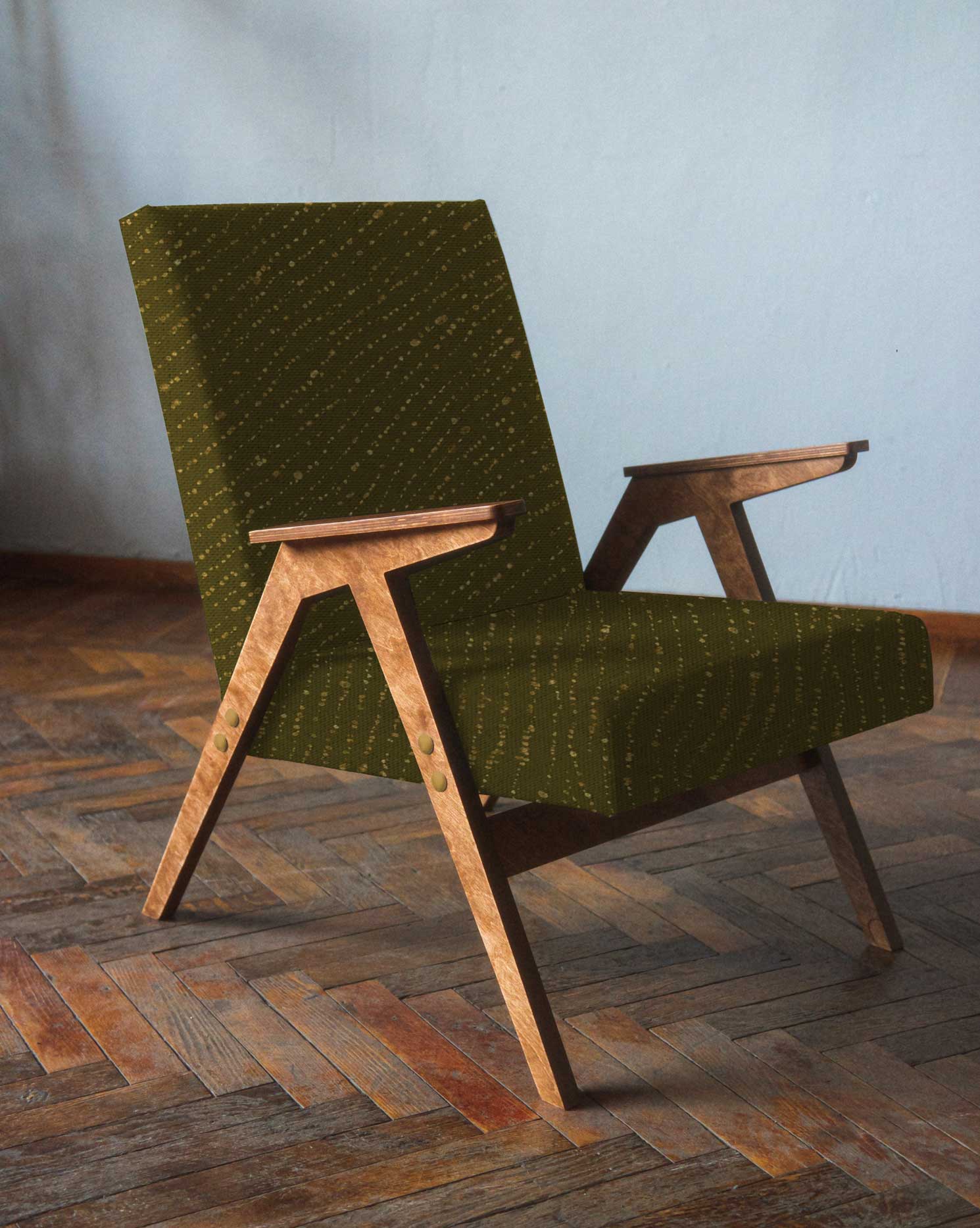 Venable Moore made to order Staccato decolorato shibori linen in fern green on modern armchair in room with parquet wooden floor