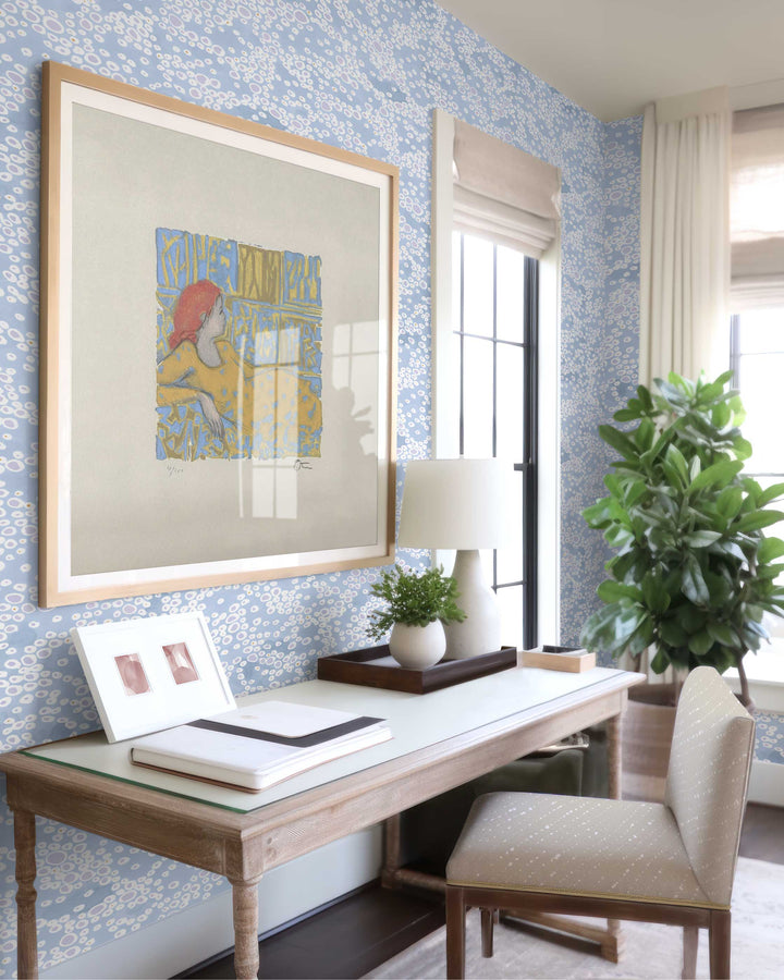 Venable Moore Frizzante Clay Coated Made to Order Wallpaper in Ice Blue in Office with desk, chair in Staccato Sbiancato Shibori in neutral flax linen, and portait of woman