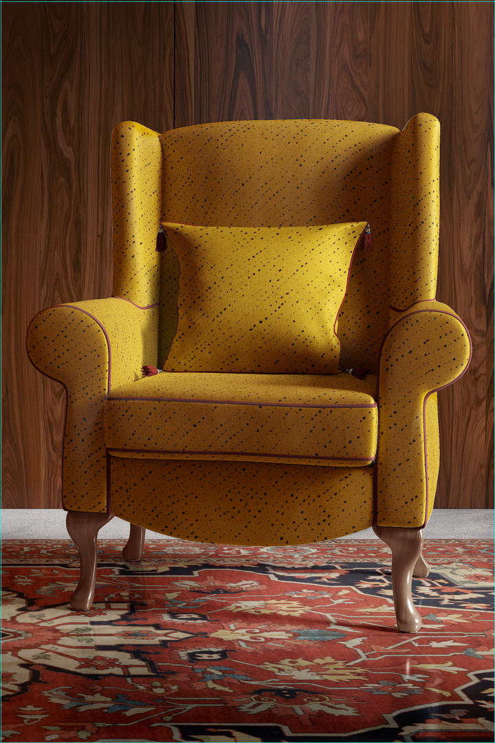 Venable Moore made to order Staccato Nero Shibori linen in marigold linen on wingback chair with pillow in elegant wood panelled room with oriental rug