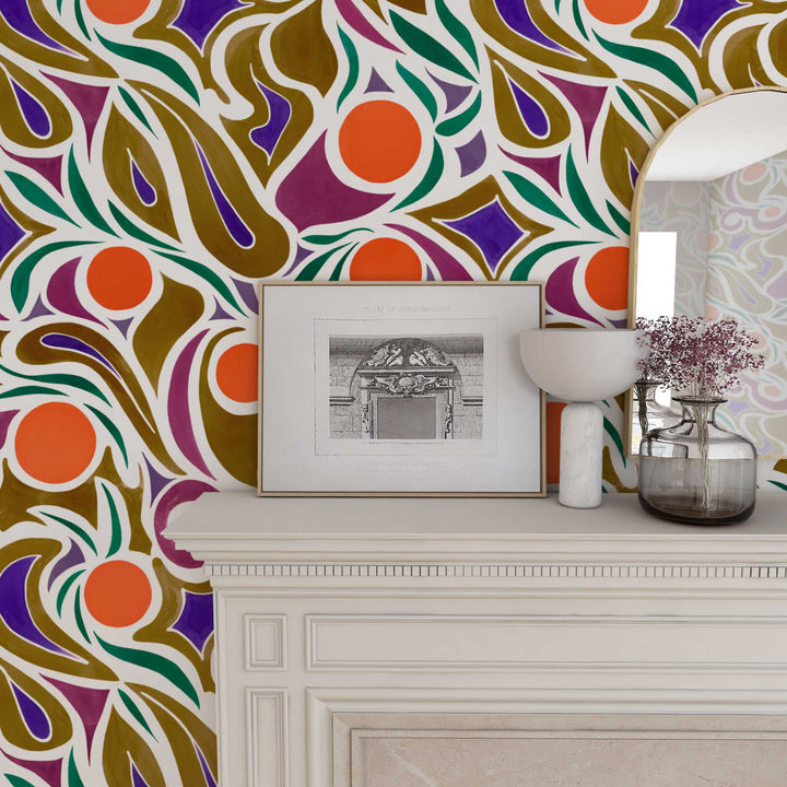 Venable Moore made to order Capri abstract floral in orange, brown, and puprle in living room with marble mantle wtih picture, vase, flowers, and mirror