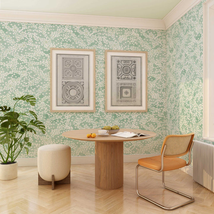 Venable Moore Frizzante clay coated wallpaper in Verdigris green in european breakfast room with modern furniture and architectural prints