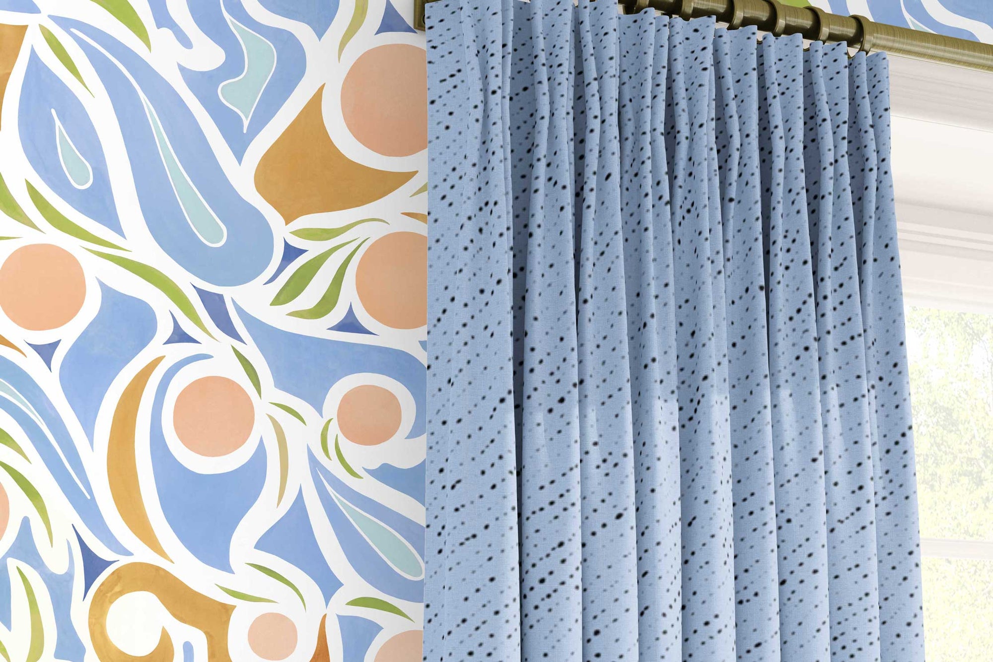 Venable Moore ‘Capri’ Pastel Peach Pink, Blue, and Tan made-to-order, printed in the U.S.A. wallpaper on a wall with 100% European linen “Staccato Nero’ Shibori curtains in sky blue and window 