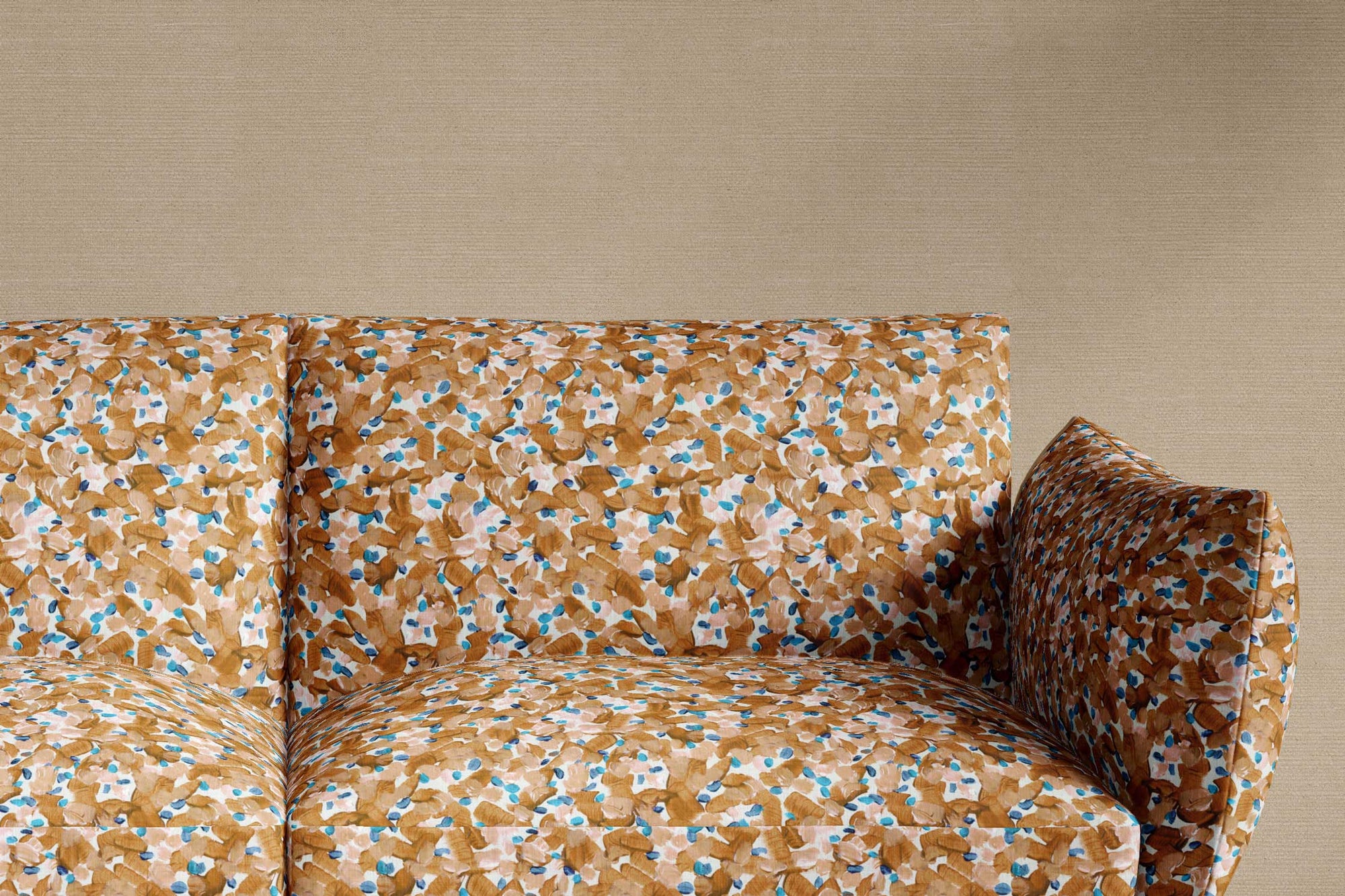 sofa upholstered in 100% cotton Venable Moore Chintz Moderne abstract floral in apricot orange, blue, and white fabric made-to-order and sustainably printed in the U.S.A. 