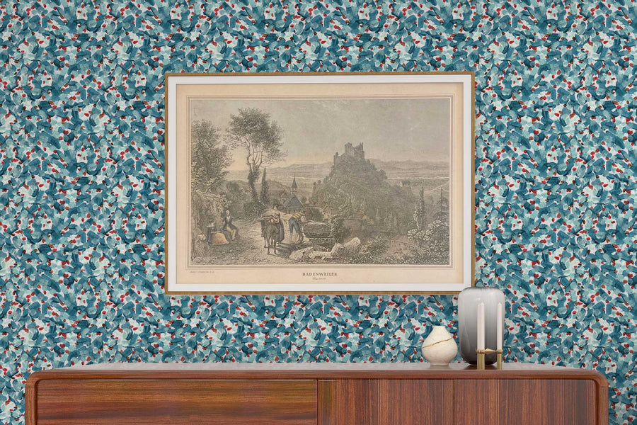 Venable Moore Chintz Modern floral abstract in turquoise blue, red, and white made-to-order, printed in the U.S.A. wallpaper on a wall with wood console, vases, and framed art