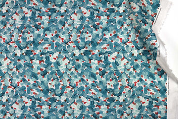 Venable Moore 100% Cotton Chintz Moderne abstract floral fabric by the yard in tropical turquoise blue, red, and white with top fold against white