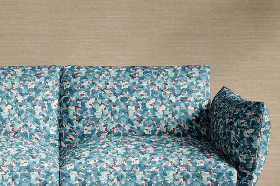 sofa upholstered in 100% cotton Venable Moore Chintz Moderne abstract floral in tropical turquoise, red, and white fabric made-to-order and sustainably printed in the U.S.A.