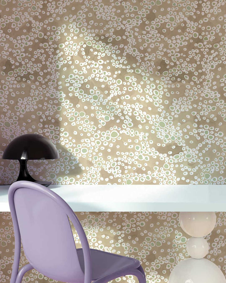 Venable Moore made to order Frizzante dotted wallpaper in Buff tan on office wall with white desk, purple chair, and black lamp