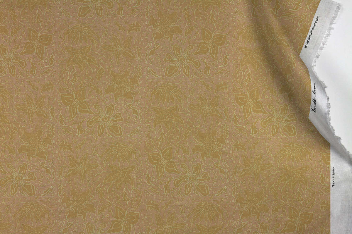 Venable Moore 100% Cotton Fiori hand drawn floral fabric by the yard in sulphur yellow with top fold against white