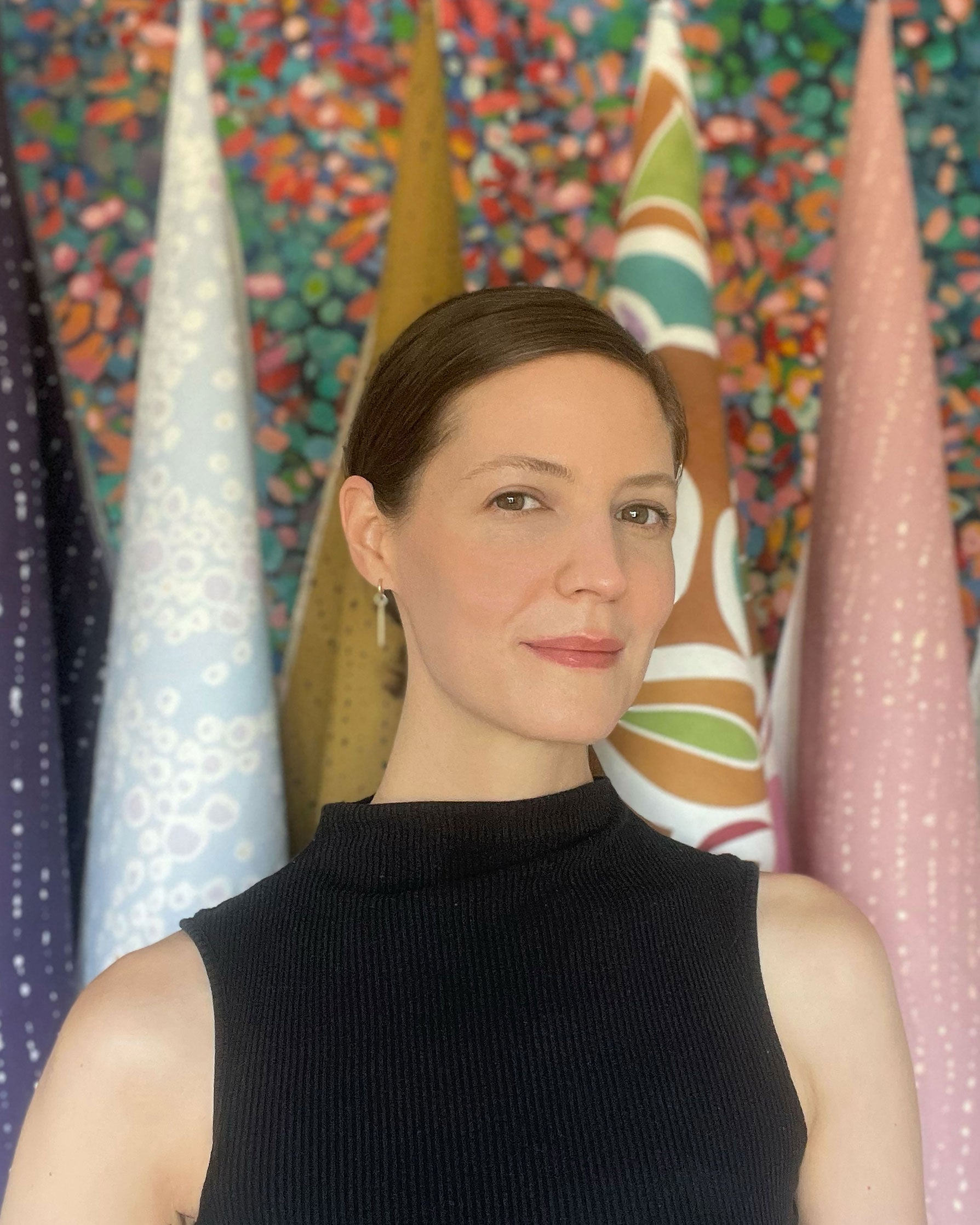 portrait of venable moore founder meredith in fron of fabric