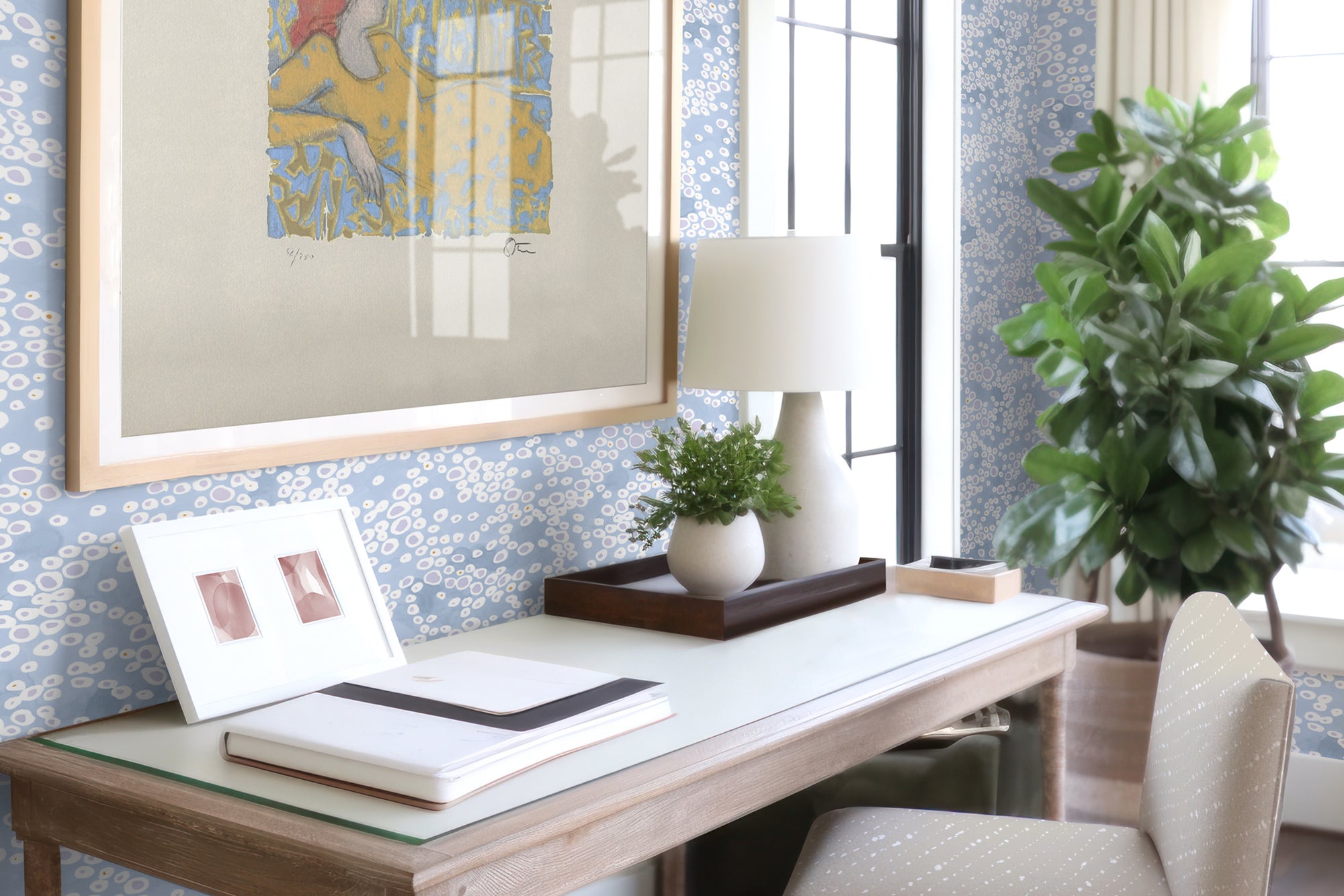 Frizzante dotted wallpaper in Ice blue installed in an office