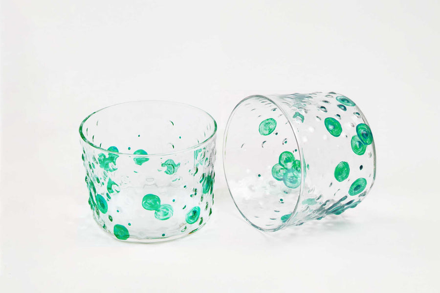 venable moore shamrock green hand-painted hand-blown bubble glasses set of two on white background one on its side