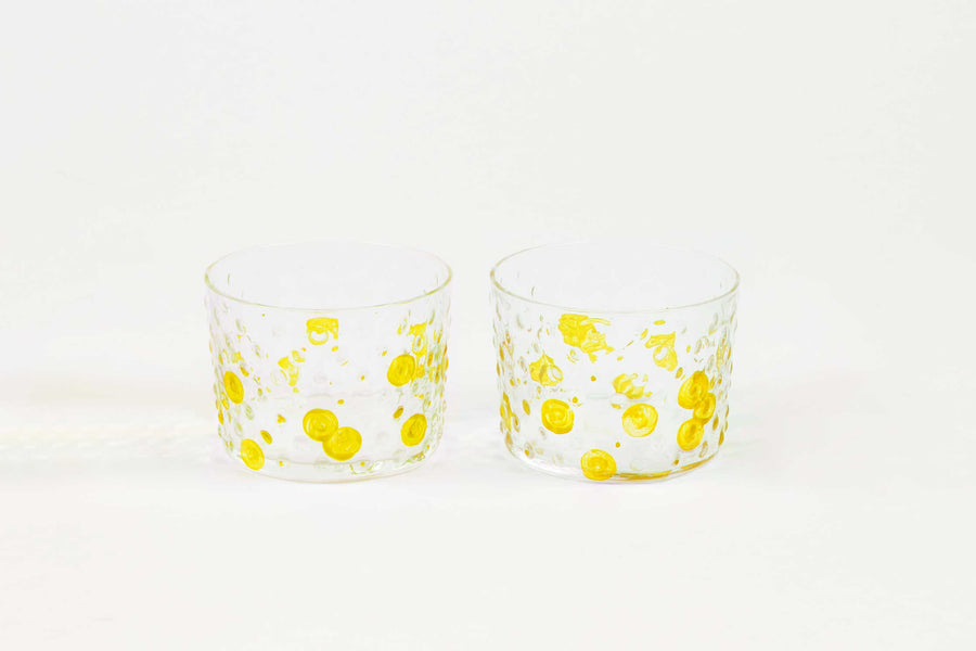 venable moore sun yellow hand-painted hand-blown bubble glasses set of two on white background side by side