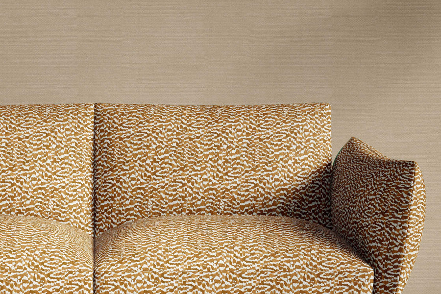 sofa upholstered in venable moore 100% European linen Zebra Stripe abstract animal fabric in chestnut brown, made-to-order and sustainably printed in the U.S.A.