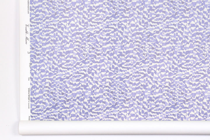 Venable Moore Zebra Stripe abstract animal in lavender purple boutique made-to-order, printed in the U.S.A. wallpaper roll against white wall