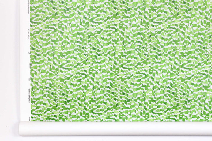 Venable Moore Zebra Stripe abstract animal in petal green boutique made-to-order, printed in the U.S.A. wallpaper roll against white wall