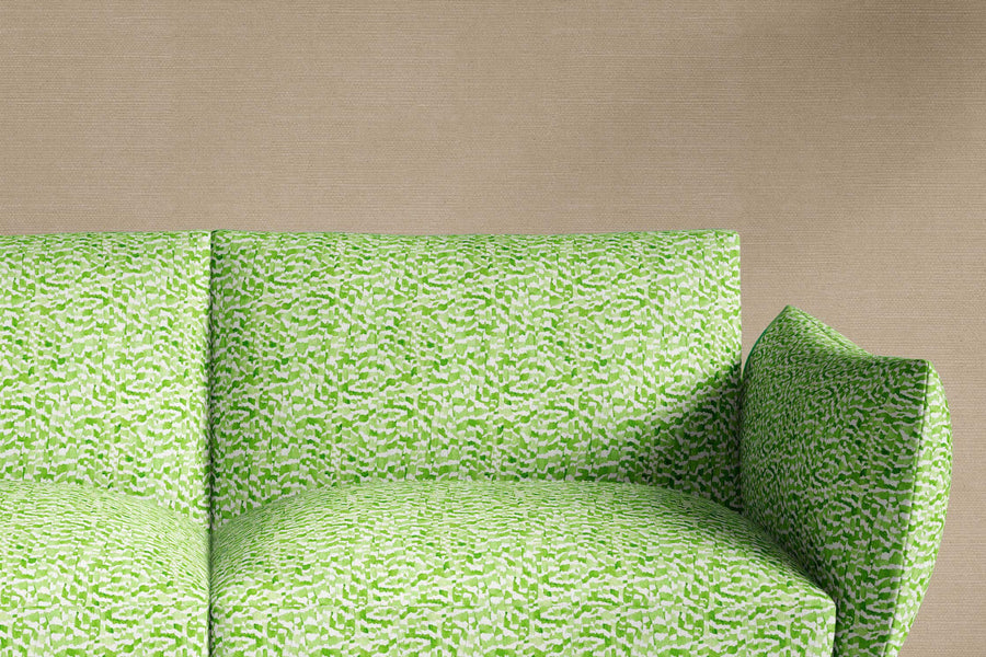 sofa upholstered in venable moore 100% European linen Zebra Stripe abstract animal fabric in petal green, made-to-order and sustainably printed in the U.S.A.