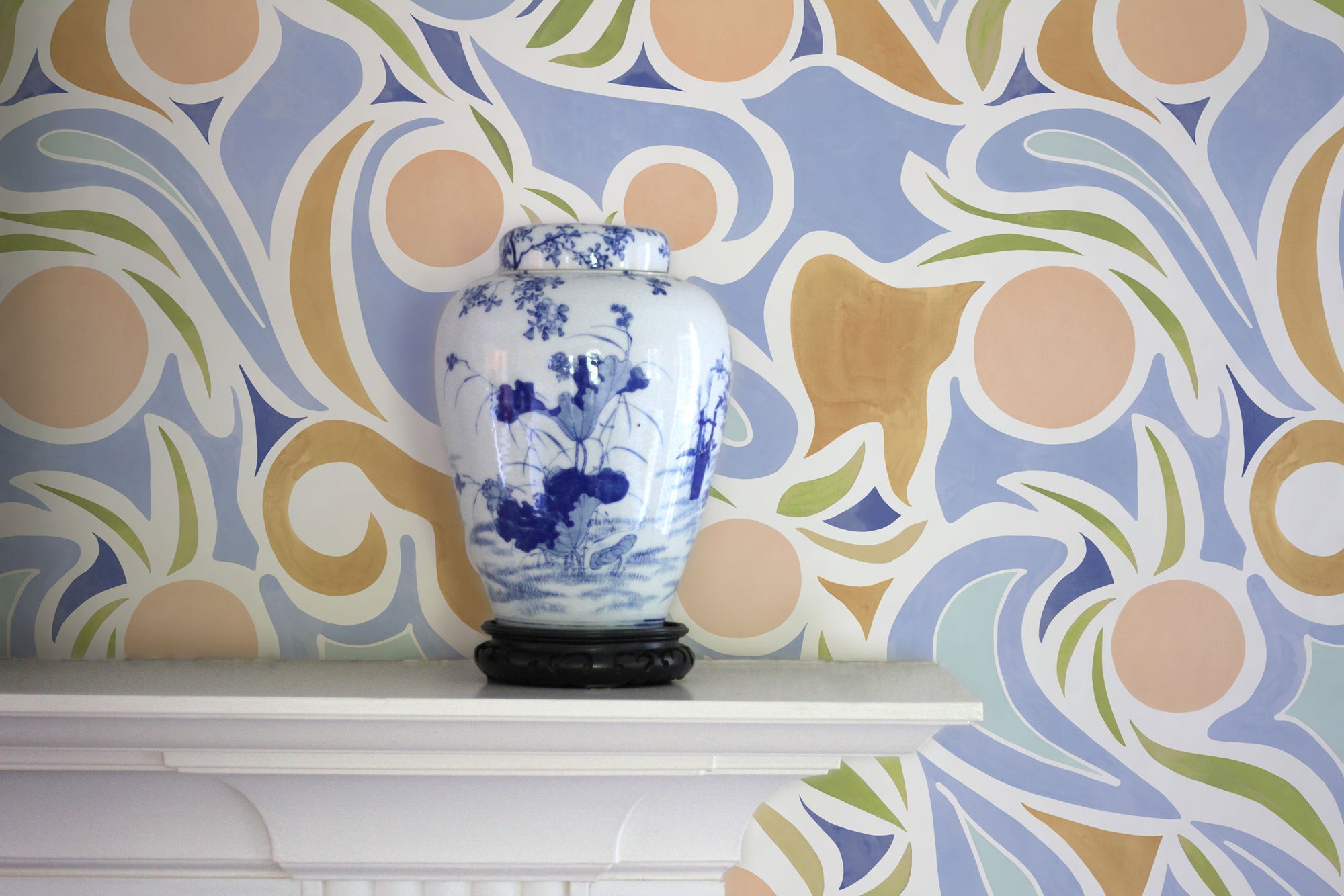 Venable Moore Capri abstract floral wallpaper install living room with mantel and vase