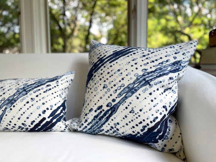 marine blue shibori pillows in fine linen fabric by the yard on white sofa 