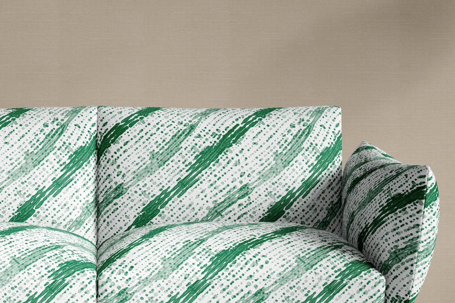 sofa upholstered in 100% linen glissando shibori fabric in emerald green