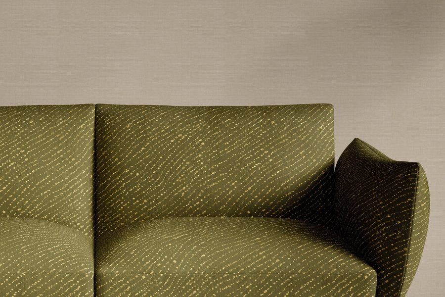 sofa upholstered in 100% linen staccato decolorato shibori fabric in fern green