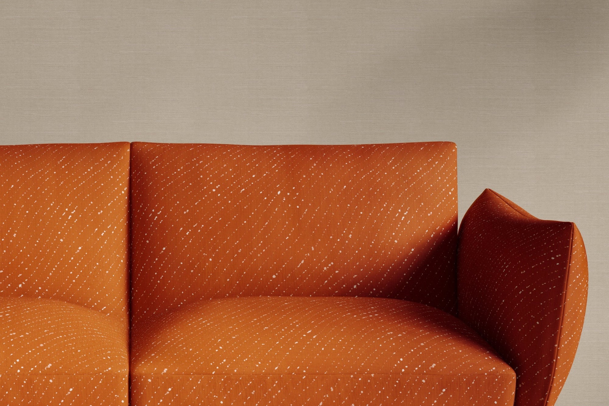 sofa upholstered in venable moore 100% european linen staccato sbiancato shibori fabric in earthy ginger orange made to order in the usa against grasscloth wall