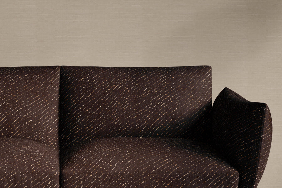 sofa upholstered in 100% linen staccato decolorato shibori fabric in onyx black