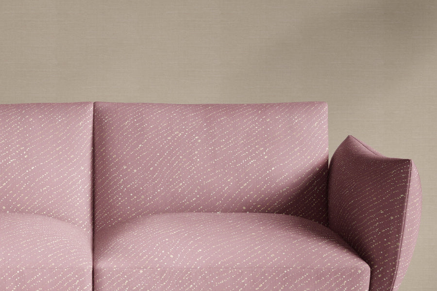 sofa upholstered in 100% linen staccato decolorato shibori fabric in rose clay pink