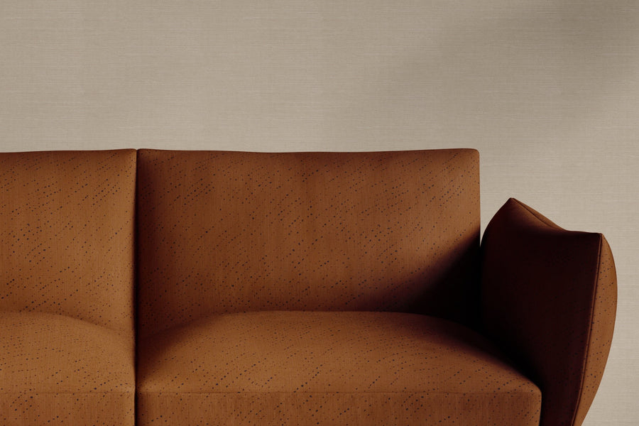 sofa upholstered in 100% linen staccato nero shibori fabric in russet brown