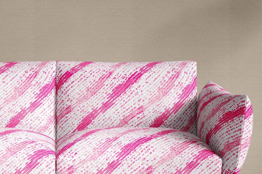 sofa upholstered in 100% linen glissando shibori fabric in strawberry pink