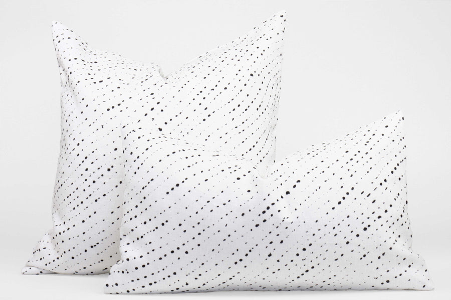 Two 100% linen staccato nero shibori pillows in alabaster white, 20” x 20” and 12” x 20”