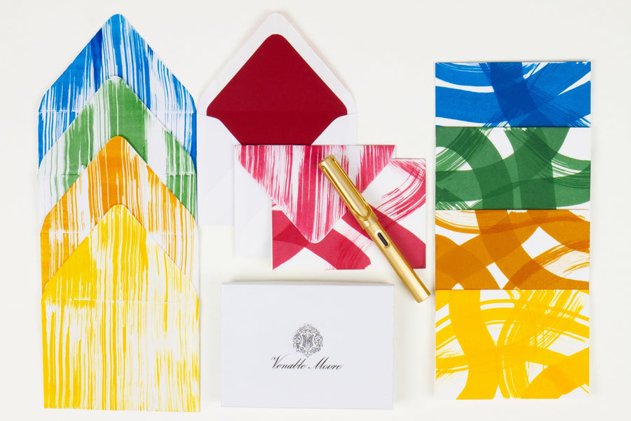 Hand-painted cards and crimson lined envelopes in multiple colors with gold pen and Venable Moore stationery box