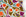 Venable Moore 100% European French linen Capri fabric by the yard in Orange, Brown, and Purple with top fold against white