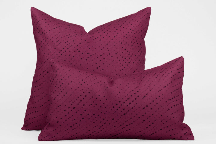 Two 100% linen staccato nero shibori pillows in cerise pink, 20” x 20” and 12” x 20”
