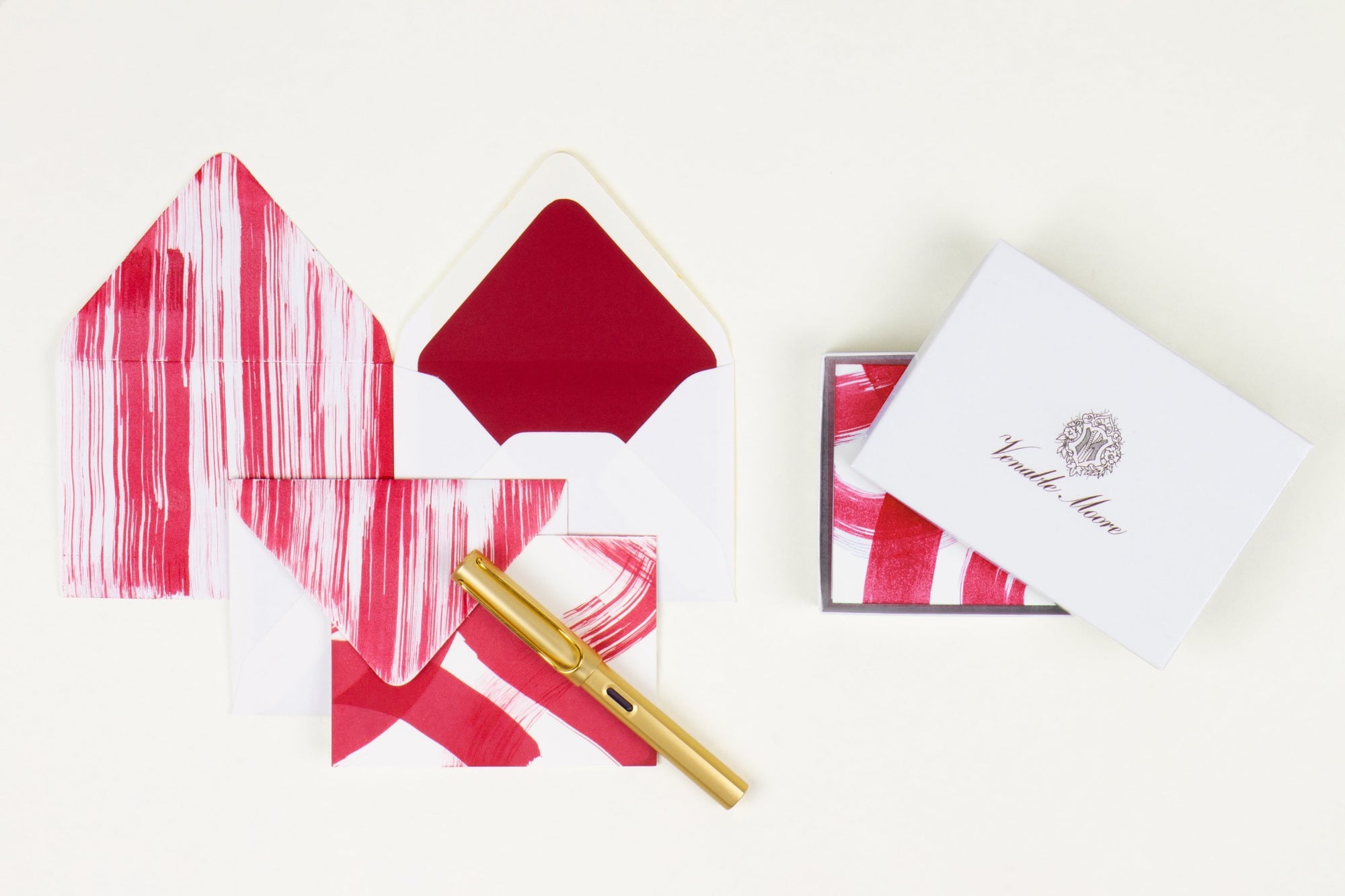 Hand-painted card and crimson lined envelopes in crimson red with gold pen and Venable Moore stationery box