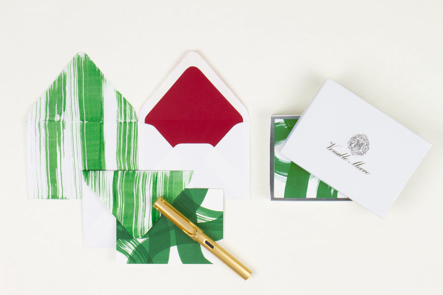 Hand-painted card and crimson lined envelopes in pine green with gold pen and Venable Moore stationery box