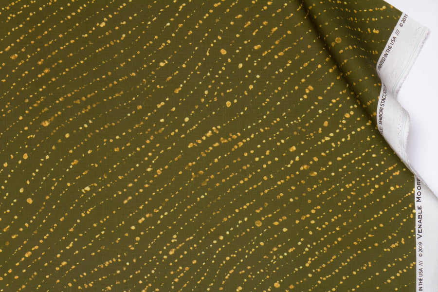100% linen staccato decolorato shibori fabric by the yard in fern green with top fold