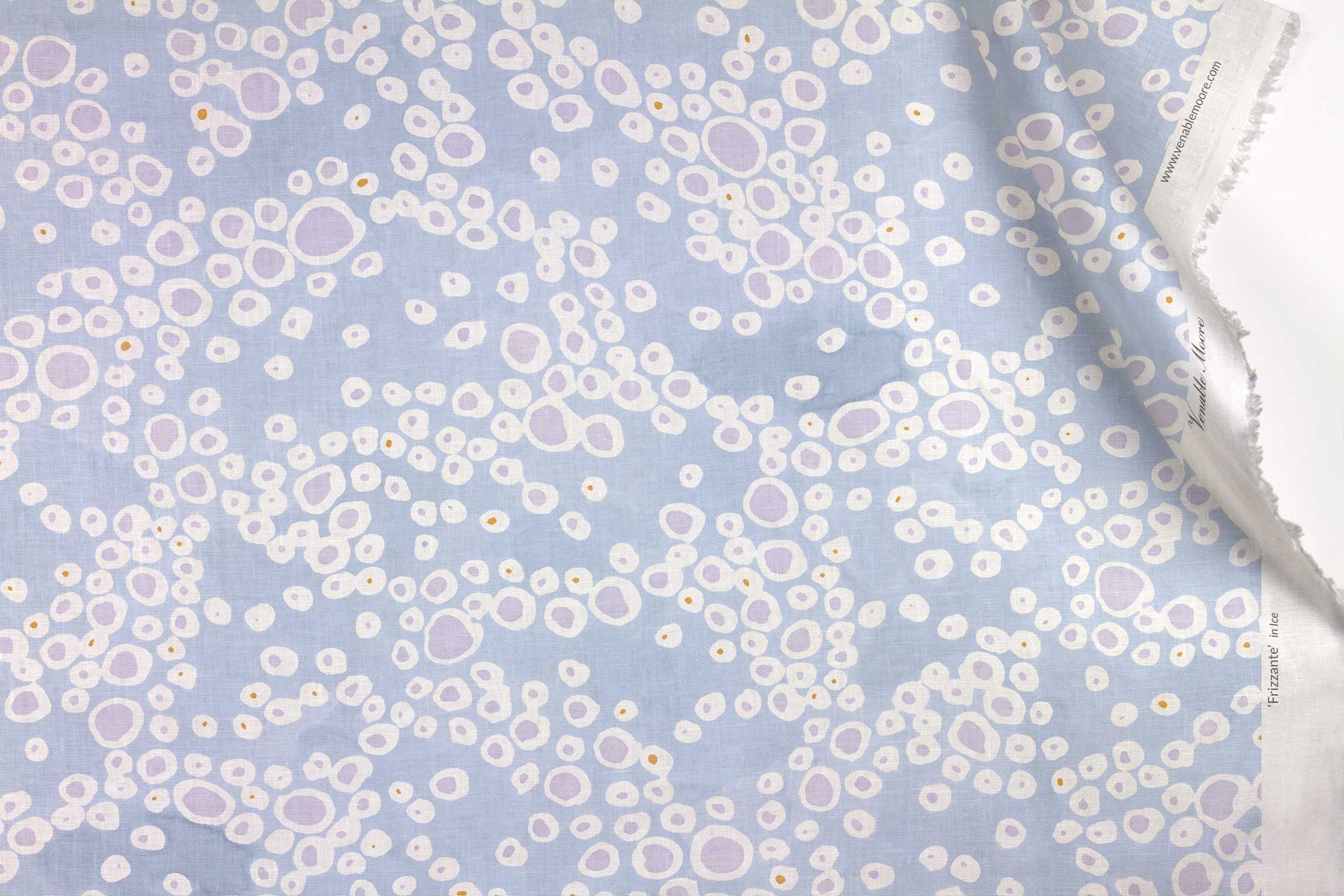 Venable Moore 100% European French linen Frizzante fabric by the yard in pastel ice blue with top fold against white 