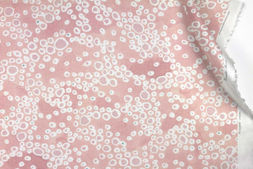 Venable Moore 100% European French linen Frizzante fabric by the yard in pastel madder pink with top fold against white 