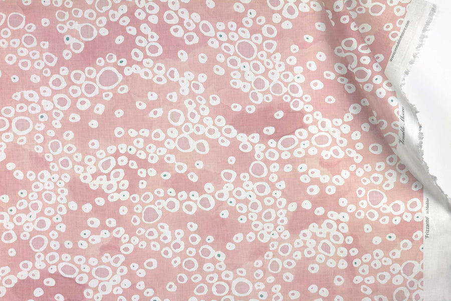 Venable Moore 100% European French linen Frizzante fabric by the yard in pastel madder pink with top fold against white 