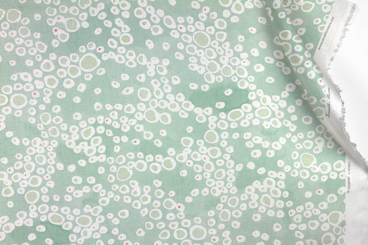 Venable Moore 100% European French linen Frizzante fabric by the yard in pastel verdigris green with top fold against white 