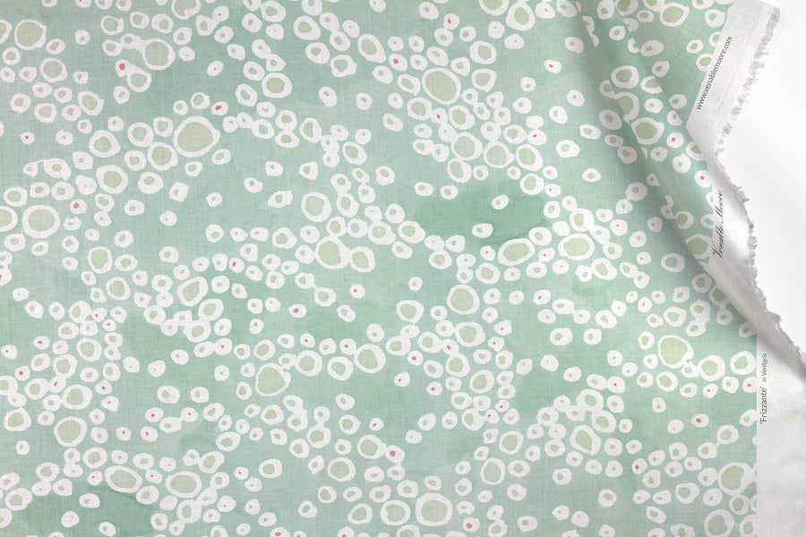 Venable Moore 100% European French linen Frizzante fabric by the yard in pastel verdigris green with top fold against white 