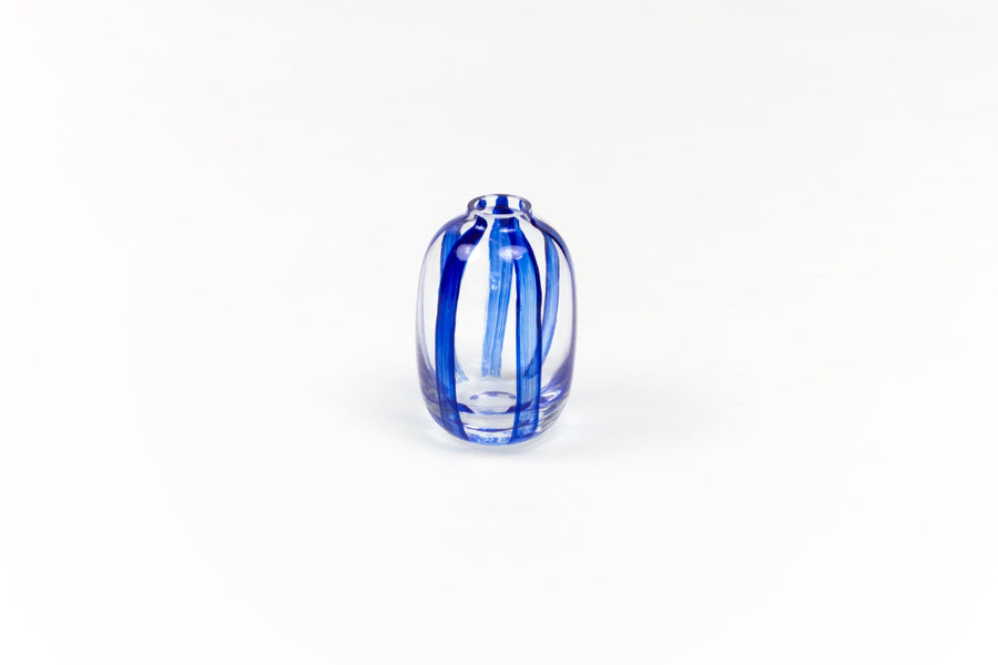 Hand-painted striped glass bud vase in lapis blue