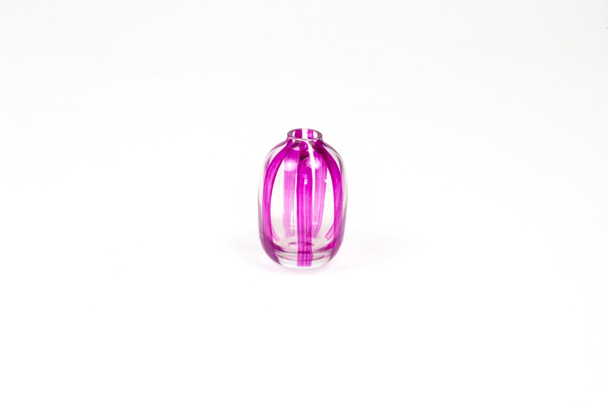 Hand-painted striped glass bud vase in magenta pink 