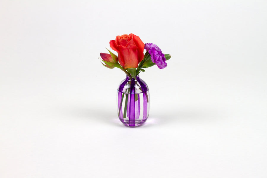 Hand-painted striped glass bud vase in royal purple with roses and carnation