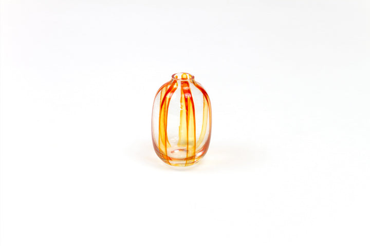 Hand-painted striped glass bud vase in tangerine orange